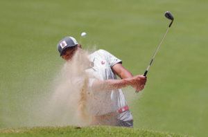 JAMM AQUINO / JAQUINO @STARADVERTISER.COM 
                                Peter Jung blasted out of a greenside bunker on the 15th green during Saturday’s final.