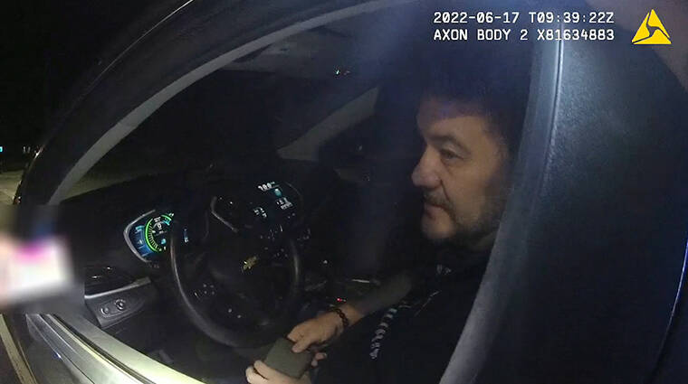 COURTESY HPD
                                This image made from a screenshot of body cam footage shows a police officer talking to Rep. Matthew LoPresti about taking a field sobriety test on suspicion of drunk driving.