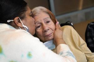 ASSOCIATED PRESS
                                Rosa DeSoto, left, embraces her 93-year-old mother Gloria DeSoto.