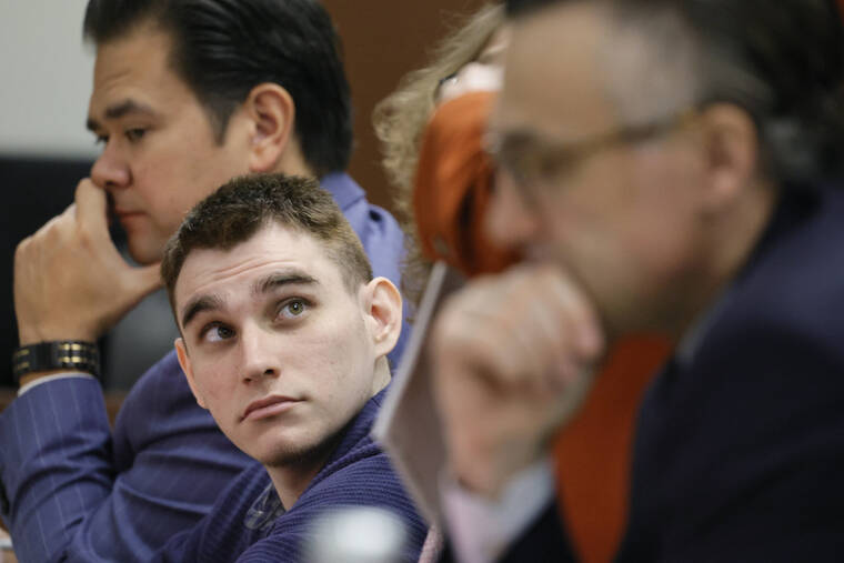 AMY BETH BENNETT/SOUTH FLORIDA SUN-SENTINEL VIA AP / JUNE 29
                                Marjory Stoneman Douglas High School shooter Nikolas Cruz sits at the defense table during jury selection in the penalty phase of his trial at the Broward County Courthouse in Fort Lauderdale, Fla. The judge has refused to delay the sentencing trial of Cruz in the 2018 shooting at a high school in which 17 people were killed.