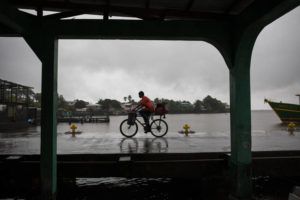 ASSOCIATED PRESS / JULY 1
                                A man rides his bicycle in the rain brought by Tropical Storm Bonnie in Bluefields, Nicaragua, Friday.