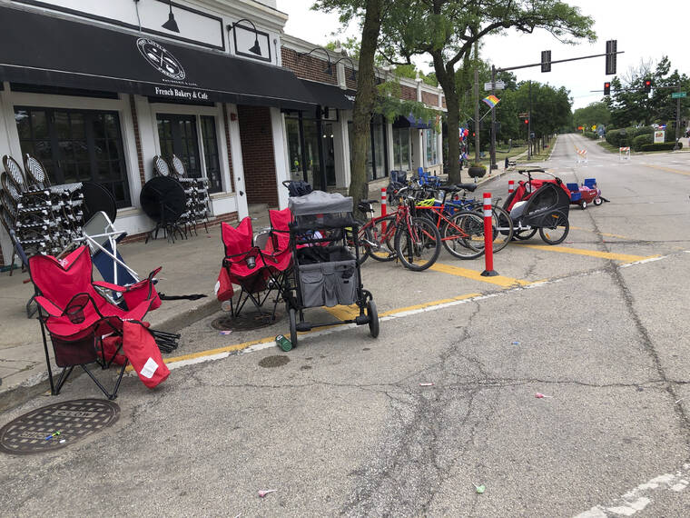 LYNN SWEET/CHICAGO SUN-TIMES VIA ASSOCIATED PRESS
                                Terrified parade-goers fled Highland Park’s Fourth of July parade after shots were fired, leaving behind their belongings as they sought safety, today, in Highland Park, Ill.