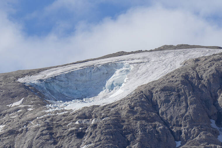 ASSOCIATED PRESS
                                A view of the Punta Rocca glacier near Canazei, in the Italian Alps in northern Italy, today, two days after a huge chunk of the glacier broke loose, sending an avalanche of ice, snow, and rocks onto hikers.