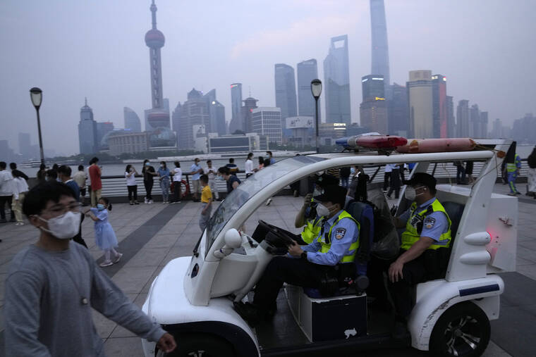 ASSOCIATED PRESS
                                Chinese policemen patrol the bund area, June 1, in Shanghai. Hackers claim to have obtained a trove of data on 1 billion Chinese from a Shanghai police database in a leak that, if confirmed, could be one of the largest data breaches in history.