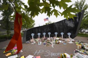 ASSOCIATED PRESS
                                A memorial to the seven people killed and others injured in Monday’s Fourth of July mass shooting grows at a veterans memorial, today, in Highland Park, Ill., a Chicago suburb.