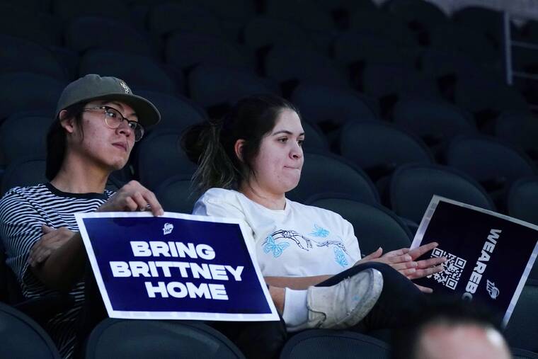 ROSS D. FRANKLIN / AP
                                Phoenix Mercury fans attend a rally for Mercury basketball player Brittney Griner Wednesday in Phoenix.
