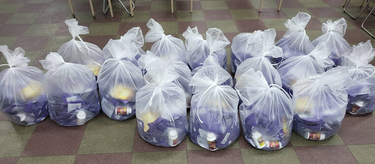 ASSOCIATED PRESS
                                Plastic bags containing masks and medicines are placed in the border town Gimpo, South Korea.