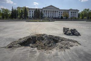 ASSOCIATED PRESS / JULY 16
                                A crater in the aftermath of a Russian missile strike, in front of the city council hall building, in Kramatorsk city hall, eastern Ukraine. Ukrainians living in the path of Russia’s invasion in the besieged eastern Donetsk region are bracing themselves for the possibility that they will have to evacuate.