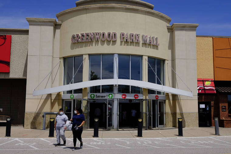 ASSOCIATED PRESS / 2020
                                Shoppers leave the Greenwood Park Mall in Greenwood, Ind. Indianapolis Metropolitan Police said several people were killed and others injured in a shooting at the mall in Greenwood.