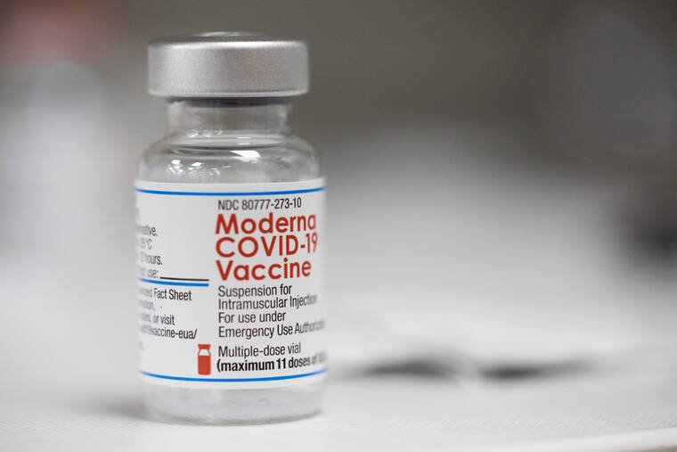 ASSOCIATED PRESS
                                A vial of the Moderna COVID-19 vaccine is displayed on a counter at a pharmacy in Portland, Ore. on Dec. 27, 2021. The Biden administration said, today, it has reached an agreement to buy 66 million doses of Moderna’s next generation of COVID-19 vaccine that specifically targets the highly transmissible omicron variant, ensuring enough supply this winter for everyone who wants the upgraded booster.