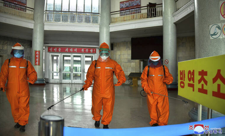 KOREAN CENTRAL NEWS AGENCY / KOREA NEWS SERVICE / AP
                                In this photo provided by the North Korean government, station staff disinfect the floor of Pyongyang station to curb the spread of coronavirus infection, in Pyongyang, North Korea on May 17.