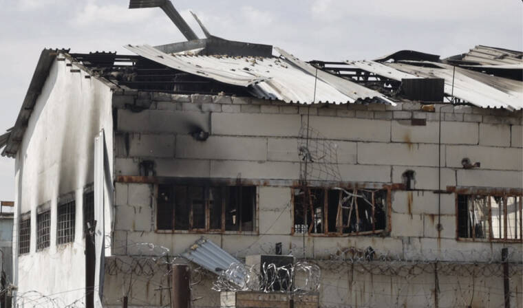 ASSOCIATED PRESS
                                In this photo taken from video shows a view of a destroyed barrack at a prison in Olenivka, in an area controlled by Russian-backed separatist forces, in eastern Ukraine on Friday.