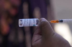 ASSOCIATED PRESS / SEPT. 17
                                A healthcare worker prepares a dose of the AstraZeneca COVID-19 vaccine during a door-to-door vaccination campaign, in El Alto, Bolivia.