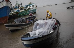 ASSOCIATED PRESS / JULY 1
                                People leave the port by boat to return their communities amid the arrival of then-Tropical Storm Bonnie in Bluefields, Nicaragua.