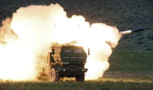 THE OLYMPIAN / AP / 2011
                                A launch truck fires the High Mobility Artillery Rocket System (HIMARS) produced by Lockheed Martin during combat training in the high desert of the Yakima Training Center, Washington.