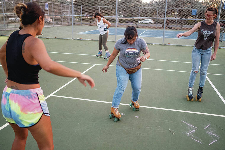 CABLE HOOVER / SPECIAL TO THE STAR-ADVERTISER
                                Barbara Delaforce, center, shows Melissa Garvey, right, and Harmony Moses how to skate around chalk markings at Geiger Park in Ewa.