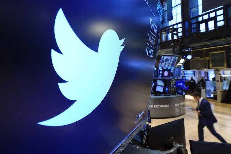 ASSOCIATED PRESS / 2021 The logo for Twitter appears above a trading post on the floor of the New York Stock Exchange.