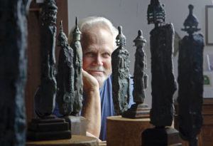 ASSOCIATED PRESS / SEPT. 18
                                Tony Dow, actor, director and artist, poses with some of his works at his home and studio in the Topanga area of Los Angeles. “Leave It to Beaver” actor Dow has died at age 77.