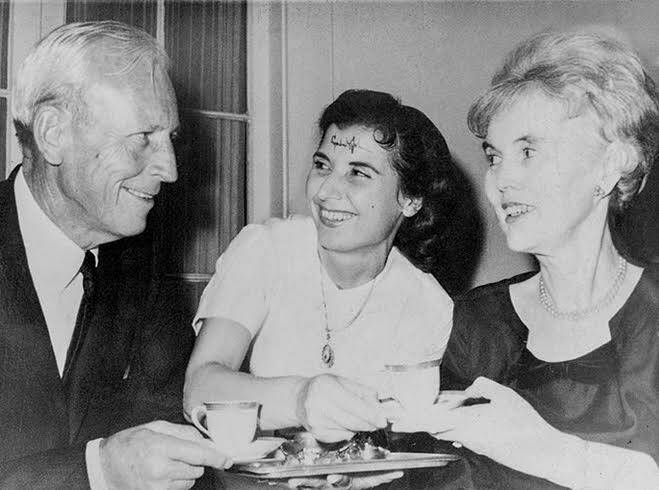 COURTESY DAVID YAMADA
                                Gov. John Burns and wife Beatrice, at Fisherman’s Wharf restaurant at Kewalo Basin after President Lyndon B. Johnson autographed Maria Yamada’s forehead.