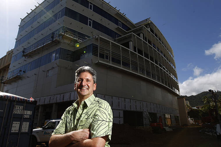 STAR-ADVERTISER FILE
                                David Lassner outside the Information Technology Building at the University of Hawaii at Manoa campus. The University of Hawaii captured $505 million in research funding in fiscal year 2022, topping the half-billion-dollar mark for the first time in its history.