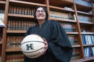 CRAIG T. KOJIMA / CKOJIMA@ STARADVERTISER.COM
                                Sabrina McKenna was encouraged to try out for the UH basketball team. She made the team and, to her surprise, received a scholarship. Now, McKenna, posing in her office, is a justice of the Supreme Court of the State of Hawaii.