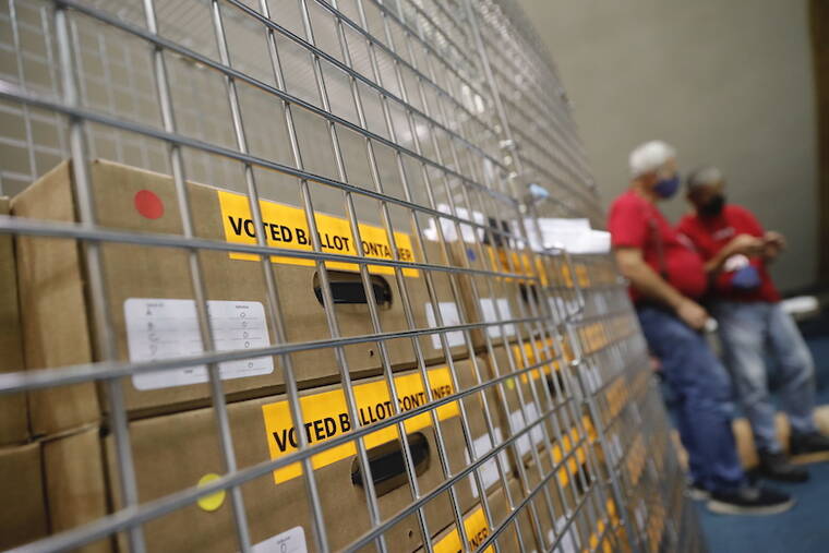 JAMM AQUINO / JAQUINO@STARADVERTISER.COM
                                Cages holding counted ballots are seen on the state Senate floor at the State Capitol Thursday.