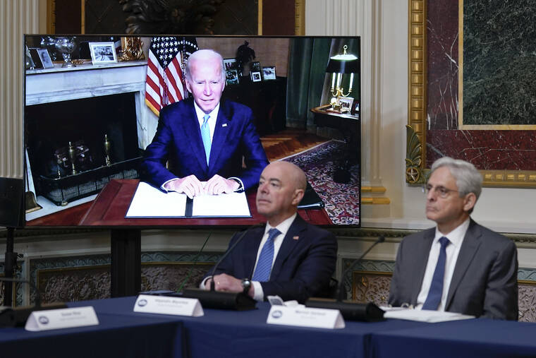 ASSOCIATED PRESS
                                Homeland Security Secretary Alejandro Mayorkas and Attorney General Merrick Garland, right, listen as President Joe Biden speaks virtually during the first meeting of the interagency Task Force on Reproductive Healthcare Access in the Indian Treaty Room in the Eisenhower Executive Office Building on the White House Campus in Washington, today.