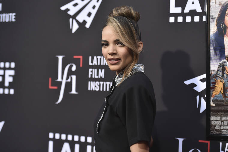 INVISION / AP
                                Leslie Grace arrives at a screening of “In the Heights” during the Los Angeles Latino International Film Festival on June 4, 2021.