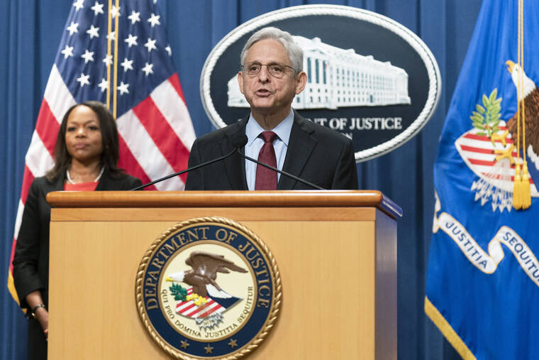 ASSOCIATED PRESS
                                Attorney General Merrick Garland with Assistant Attorney General Kristen Clarke for the Civil Rights Division, speaks during a news conference at the Department of Justice in Washington, today. The U.S. Justice Department announced civil rights charges today against four Louisville police officers over the drug raid that led to the death of Breonna Taylor, a Black woman whose fatal shooting contributed to the racial justice protests that rocked the U.S. in the spring and summer of 2020.