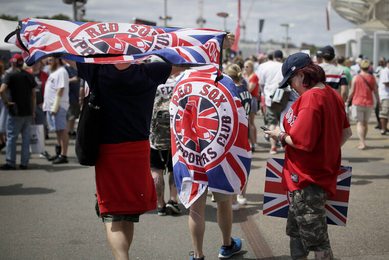ASSOCIATED PRESS
                                Fans arrive at London Stadium for a baseball game between the New York Yankees and the Boston Red Sox in London on June 30, 2019.