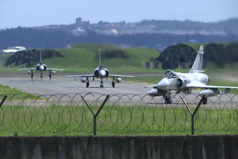 ASSOCIATED PRESS
                                Taiwan Air Force Mirage fighter jets taxi on a runway at an airbase in Hsinchu, Taiwan, Friday. China cut off contacts with the United States on vital issues today — including military matters and crucial climate cooperation — as concerns rose that the Communist government’s hostile reaction to House Speaker Nancy Pelosi’s Taiwan visit could signal a lasting, more aggressive approach toward its U.S. rival and the self-ruled island.