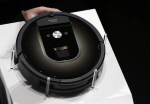 ASSOCIATED PRESS / 2015
                                A Roomba 980 vacuum cleaning robot is presented during a presentation in Tokyo.