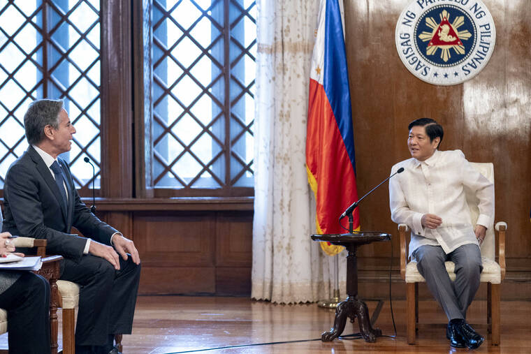 ASSOCIATED PRESS
                                Secretary of State Antony Blinken, left, meets with Philippine President Ferdinand Marcos Jr. at the Malacanang Palace in Manila.