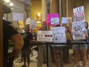 ASSOCIATED PRESS
                                Abortion-rights protesters fill Indiana Statehouse corridors and cheer outside legislative chambers, Friday, Aug. 5, as lawmakers vote to concur on a near-total abortion ban, in Indianapolis.