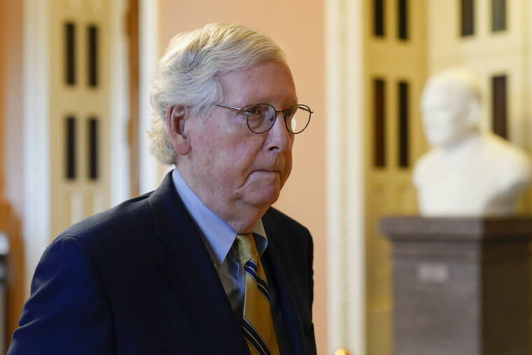 ASSOCIATED PRESS
                                Senate Minority Leader Mitch McConnell of Ky., walks to his office on Capitol Hill in Washington, Saturday, Aug. 6.