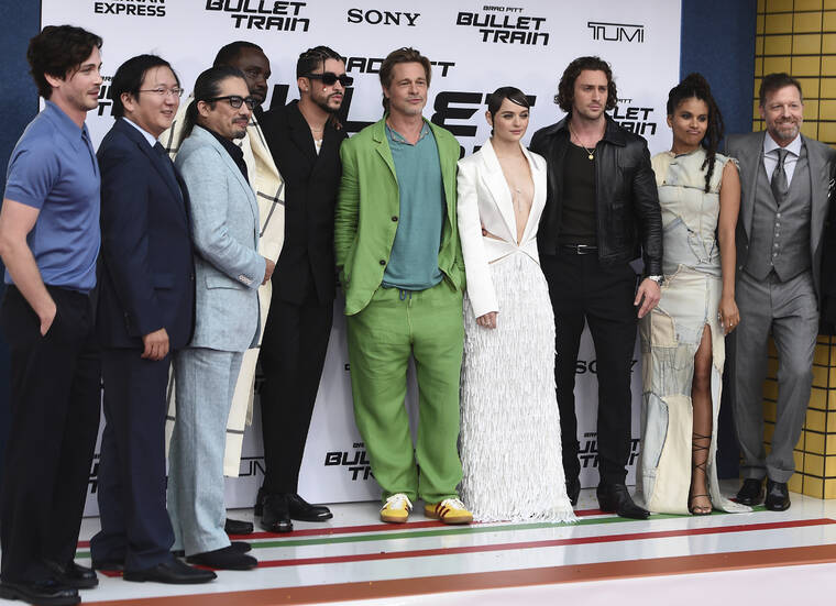 JORDAN STRAUSS/INVISION/AP / AUG. 1
                                The cast of “Bullet Train” pose on the red carpet at the film’s premiere at the Regency Village Theatre in Los Angeles. Pictured from left is Logan Lerman, Masi Oka, Hiroyuki Sanada, Brian Tyree Henry, Bad Bunny, Brad Pitt, Joey King, Aaron Taylor-Johnson, Zazie Beetz and director David Leitch.