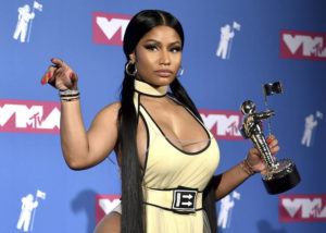 EVAN AGOSTINI/INVISION/ASSOCIATED PRESS
                                Nicki Minaj poses in the press room with her award for best hip-hop video for “Chun-Li” at the MTV Video Music Awards in New York in August 2018. Minaj will receive the Video Vanguard Award at the MTV Awards later this month.