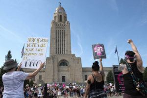 LINCOLN JOUNRAL STAR / AP / JULY 4
                                Protesters line the street around the front of the Nebraska State Capitol during an Abortion Rights Rally held on July 4, in Lincoln, Neb.