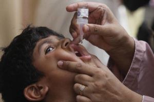 ASSOCIATED PRESS / MAY 23
                                A health worker gives a polio vaccine to a child in Karachi, Pakistan, May 23.