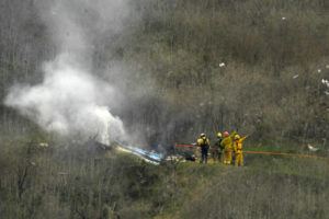 ASSOCIATED PRESS / 2020
                                Firefighters work the scene of a helicopter crash where former NBA basketball star Kobe Bryant died in Calabasas, Calif., Jan. 26.