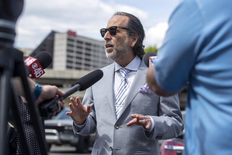 ATLANTA JOURNAL-CONSTITUTION / AP / APRIL 27
                                Attorney Drew Findling makes remarks regarding his client, Clayton County Sheriff Victor Hill, during a news conference outside of the Richard B. Russell Federal building in Atlanta on April 27