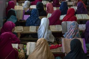 ASSOCIATED PRESS
                                Afghan girls read the Quran in the Noor Mosque outside the city of Kabul, Afghanistan.