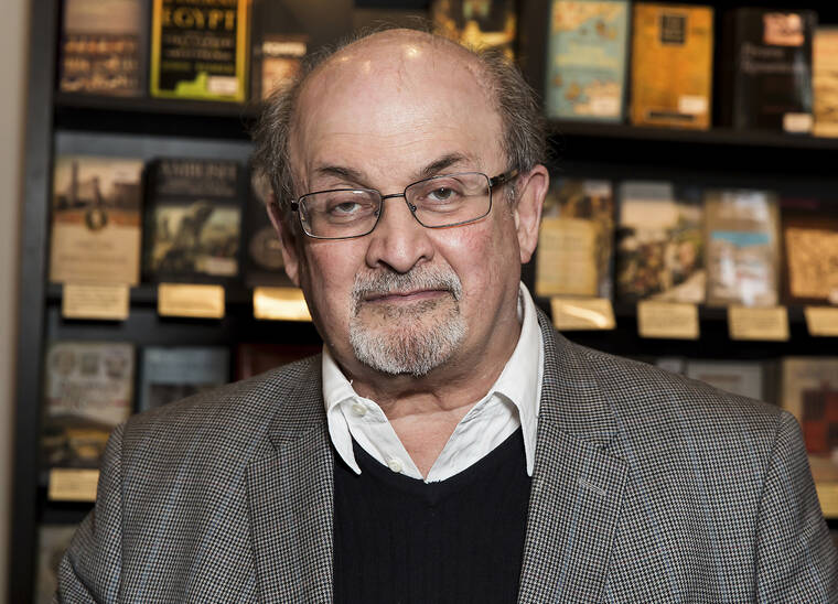 GRANT POLLARD/INVISION/ASSOCIATED PRESS
                                Author Salman Rushdie appears at a signing for his book “Home” in London in June 2017. Rushdie was attacked while giving a lecture in western New York. An Associated Press reporter witnessed a man storm the stage today at the Chautauqua Institution as Rushdie was being introduced.