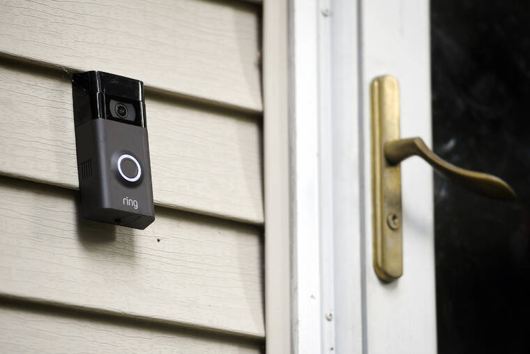 ASSOCIATED PRESS
                                A Ring doorbell camera is displayed outside a home in Wolcott, Conn., in July 2019. Two Amazon-owned companies — Ring and Hollywood studio MGM — are teaming up to create a TV show in the mold of “America’s Funniest Home Videos” using viral footage from Ring’s doorbell and smart-home cameras.