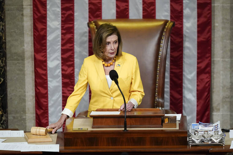 ASSOCIATED PRESS
                                House Speaker Nancy Pelosi of Calif., prepares to lead a vote on the Inflation Reduction Act in the House chamber at the Capitol in Washington, today.