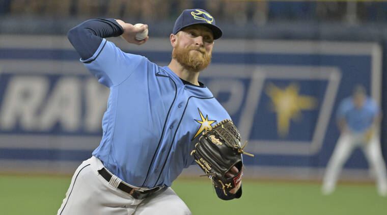 ASSOCIATED PRESS
                                Tampa Bay Rays starter Drew Rasmussen pitches against the Baltimore Orioles during the first inning of a baseball game, today, in St. Petersburg, Fla.
