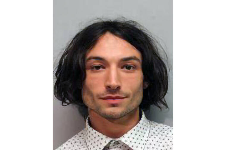 HAWAII POLICE DEPARTMENT VIA ASSOCIATED PRESS This undated photo provided by the Hawaii Police Department shows actor Ezra Miller who was arrested after an incident at a bar in Hilo. According to a report from the Vermont State Police, Aug. 8, Miller has been charged with felony burglary in Stamford, Vt., the latest in a string of recent incidents involving the embattled star of The Flash.