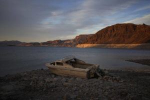 ASSOCIATED PRESS
                                A formerly sunken boat sits high and dry along the shoreline of Lake Mead at the Lake Mead National Recreation Area, May 10, near Boulder City, Nev. U.S. officials announced today that two U.S. states reliant on water from the Colorado River will face more water cuts as they endure extreme drought.