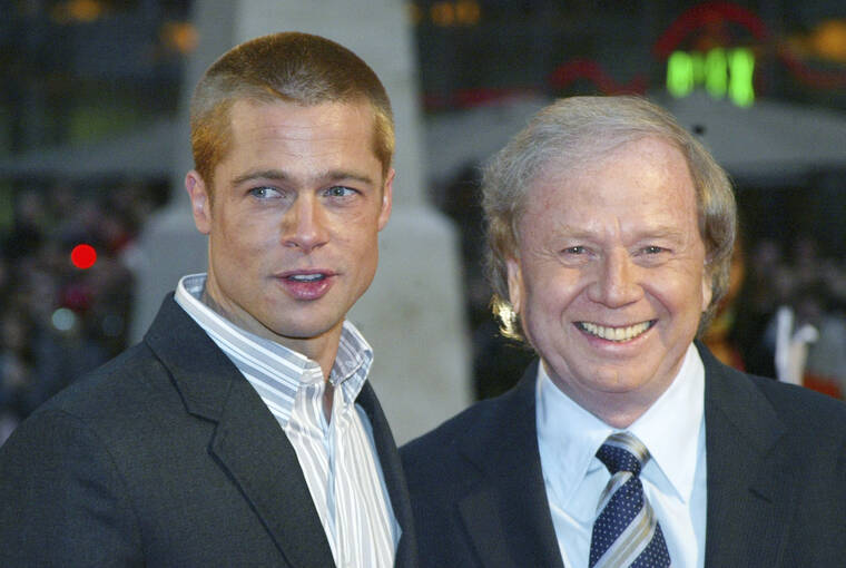 ASSOCIATED PRESS / 2004
                                Actor Brad Pitt, left, and German director Wolfgang Petersen appear at the world premiere of the film “Troy” in Berlin, Germany. Petersen, the German filmmaker whose WWII submarine epic “Das Boot” propelled him into a blockbuster Hollywood career, died Friday at his home in the Los Angeles neighborhood of Brentwood after a battle with pancreatic cancer. He was 81.