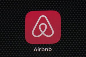 ASSOCIATED PRESS
                                The Airbnb app icon is displayed on an iPad screen in Washington, D.C., in May 2021. Airbnb announced. today, that it will use new methods to spot and block people who try to use the short-term rental service to throw a party.